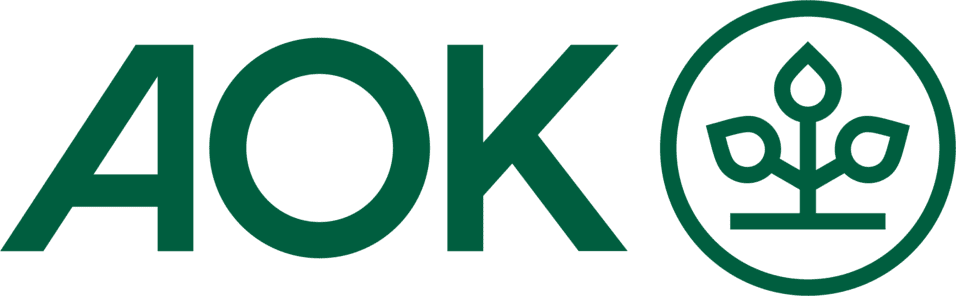 Logo der AOK mit dem Schriftzug „AOK“ in grüner Schrift und einem stilisierten Pflanzensymbol in einem Kreis.