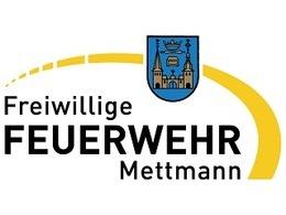 Logo der Freiwilligen Feuerwehr Mettmann mit Wappen und gelber, geschwungener Linie.