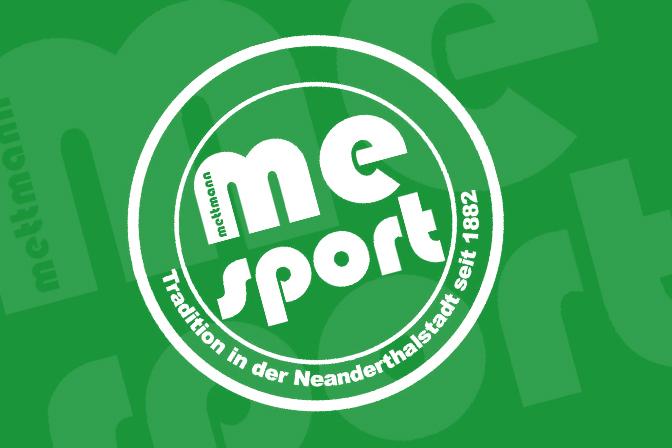 Logo von Mettmann Sport auf grünem Hintergrund mit dem Slogan „Tradition in der Neandertalsstadt seit 1882“.